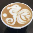 yltw’s profile photo: a cup of coffee with seahorse latte art
